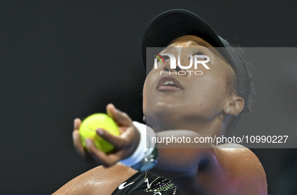 Naomi Osaka of Japan is playing in her first-round match against Caroline Garcia of France at the WTA 1000-Qatar TotalEnergies Open tennis t...