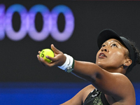 Naomi Osaka of Japan is playing in her first-round match against Caroline Garcia of France at the WTA 1000-Qatar TotalEnergies Open tennis t...