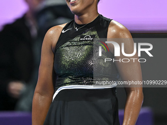 Naomi Osaka of Japan is reacting during her first-round match against Caroline Garcia of France at the WTA 1000-Qatar TotalEnergies Open ten...