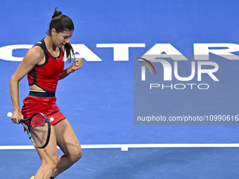 Sorana Cirstea of Romania is reacting during her second-round match against Iga Swiatek of Poland at the WTA 1000-Qatar TotalEnergies Open t...