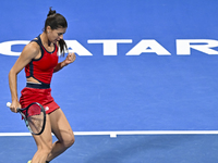 Sorana Cirstea of Romania is reacting during her second-round match against Iga Swiatek of Poland at the WTA 1000-Qatar TotalEnergies Open t...