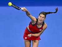 Sorana Cirstea of Romania is playing in her second-round match against Iga Swiatek of Poland at the WTA 1000-Qatar TotalEnergies Open tennis...