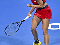 Sorana Cirstea of Romania is playing in her second-round match against Iga Swiatek of Poland at the WTA 1000-Qatar TotalEnergies Open tennis...