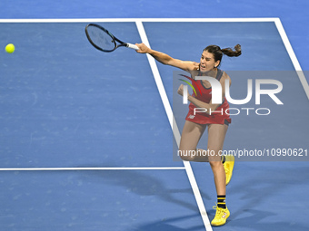 Sorana Cirstea of Romania is playing in her second-round match against Iga Swiatek of Poland at the WTA 1000-Qatar TotalEnergies Open tennis...