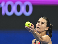 Sorana Cirstea of Romania is playing in her second-round match against Iga Swiatek of Poland at the WTA 1000-Qatar TotalEnergies Open tennis...