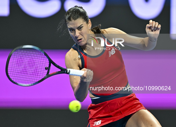 Sorana Cirstea of Romania is playing in her second-round match against Iga Swiatek of Poland at the WTA 1000-Qatar TotalEnergies Open tennis...