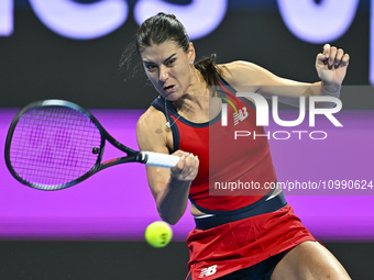 Sorana Cirstea of Romania is playing in her second-round match against Iga Swiatek of Poland at the WTA 1000-Qatar TotalEnergies Open tennis...