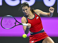 Sorana Cirstea of Romania is playing in her second-round match against Iga Swiatek of Poland at the WTA 1000-Qatar TotalEnergies Open tennis...