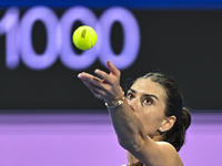 Sorana Cirstea of Romania is playing in her second-round match against Iga Swiatek of Poland at the WTA 1000-Qatar TotalEnergies Open tennis...