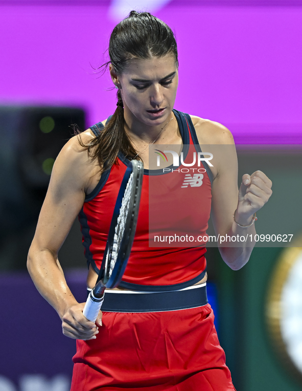 Sorana Cirstea of Romania is reacting during her second-round match against Iga Swiatek of Poland at the WTA 1000-Qatar TotalEnergies Open t...