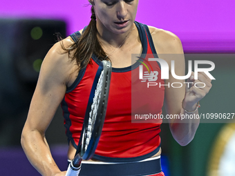 Sorana Cirstea of Romania is reacting during her second-round match against Iga Swiatek of Poland at the WTA 1000-Qatar TotalEnergies Open t...