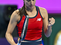 Sorana Cirstea of Romania is reacting during her second-round match against Iga Swiatek of Poland at the WTA 1000-Qatar TotalEnergies Open t...