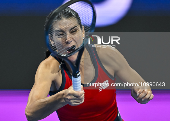 Sorana Cirstea of Romania is playing in her second-round match against Iga Swiatek of Poland at the WTA 1000-Qatar TotalEnergies Open tennis...