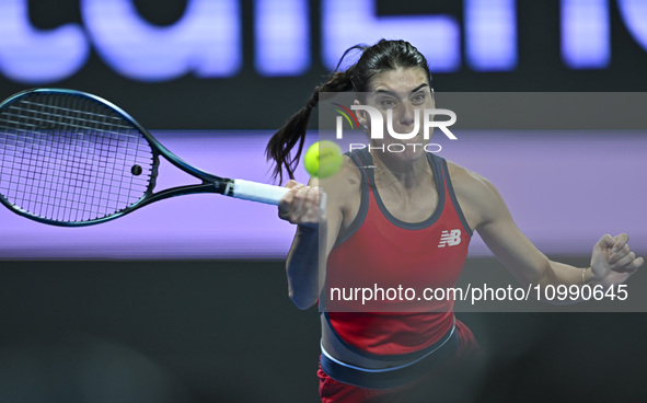 Sorana Cirstea of Romania is playing in her second-round match against Iga Swiatek of Poland at the WTA 1000-Qatar TotalEnergies Open tennis...