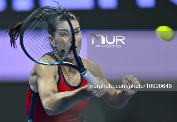 Sorana Cirstea of Romania is playing in her second-round match against Iga Swiatek of Poland at the WTA 1000-Qatar TotalEnergies Open tennis...