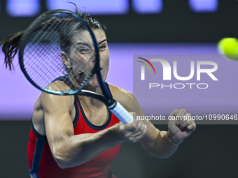 Sorana Cirstea of Romania is playing in her second-round match against Iga Swiatek of Poland at the WTA 1000-Qatar TotalEnergies Open tennis...