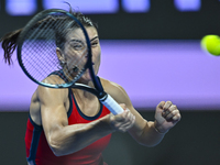 Sorana Cirstea of Romania is playing in her second-round match against Iga Swiatek of Poland at the WTA 1000-Qatar TotalEnergies Open tennis...