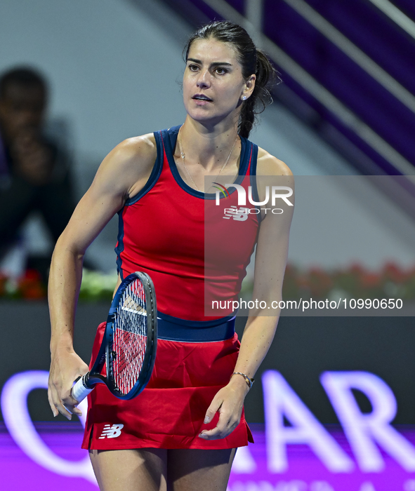 Sorana Cirstea of Romania is reacting during her second-round match against Iga Swiatek of Poland at the WTA 1000-Qatar TotalEnergies Open t...