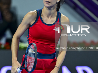 Sorana Cirstea of Romania is reacting during her second-round match against Iga Swiatek of Poland at the WTA 1000-Qatar TotalEnergies Open t...