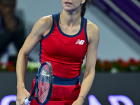 Sorana Cirstea of Romania is reacting during her second-round match against Iga Swiatek of Poland at the WTA 1000-Qatar TotalEnergies Open t...