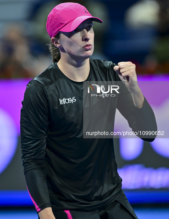 Iga Swiatek of Poland is celebrating after winning her second-round match against Sorana Cirstea of Romania at the WTA 1000-Qatar TotalEnerg...