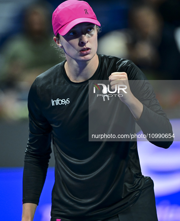 Iga Swiatek of Poland is celebrating after winning her second-round match against Sorana Cirstea of Romania at the WTA 1000-Qatar TotalEnerg...