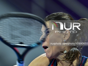 Sorana Cirstea of Romania is playing in her second-round match against Iga Swiatek of Poland at the WTA 1000-Qatar TotalEnergies Open tennis...