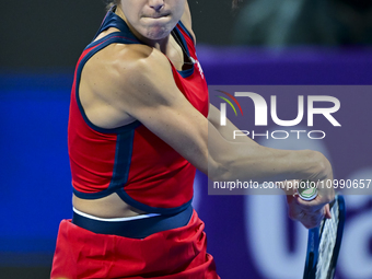 Sorana Cirstea of Romania is playing in her second-round match against Iga Swiatek of Poland at the WTA 1000-Qatar TotalEnergies Open tennis...