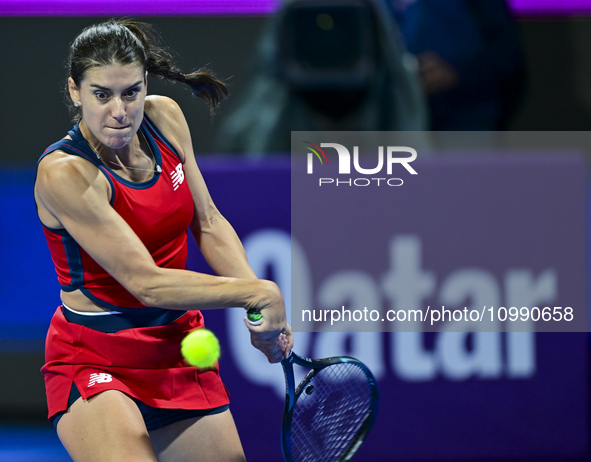 Sorana Cirstea of Romania is playing in her second-round match against Iga Swiatek of Poland at the WTA 1000-Qatar TotalEnergies Open tennis...