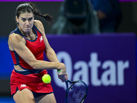 Sorana Cirstea of Romania is playing in her second-round match against Iga Swiatek of Poland at the WTA 1000-Qatar TotalEnergies Open tennis...