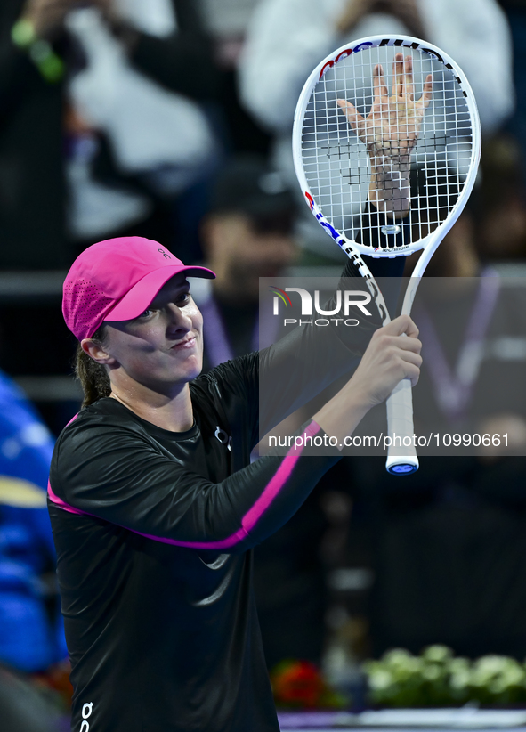 Iga Swiatek of Poland is celebrating after winning her second-round match against Sorana Cirstea of Romania at the WTA 1000-Qatar TotalEnerg...