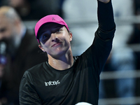 Iga Swiatek of Poland is celebrating after winning her second-round match against Sorana Cirstea of Romania at the WTA 1000-Qatar TotalEnerg...