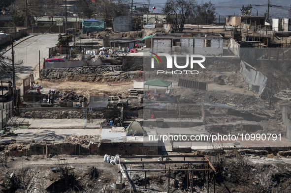 Houses are destroyed in Villa Independencia, a place devastated by the mega fire. 