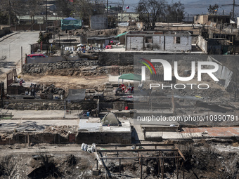 Houses are destroyed in Villa Independencia, a place devastated by the mega fire. (