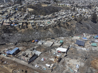 An aerial view is showing Villa Independencia, an area affected by the Valparaiso mega forest fire. (