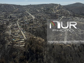 An aerial view is showing Villa Independencia, an area affected by the Valparaiso mega forest fire. (