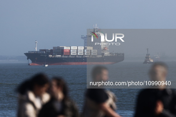 A container ship is seen in Lisbon, Portugal on February 12, 2024. 