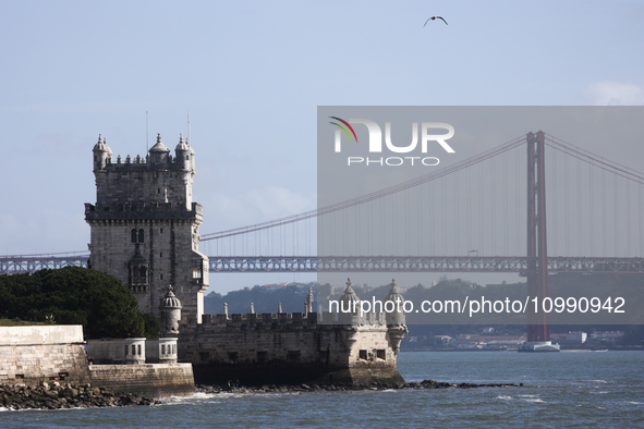 A view of the Belem Tower and 25 de Abril Bridge in Lisbon, Portugal on February 12, 2024. 