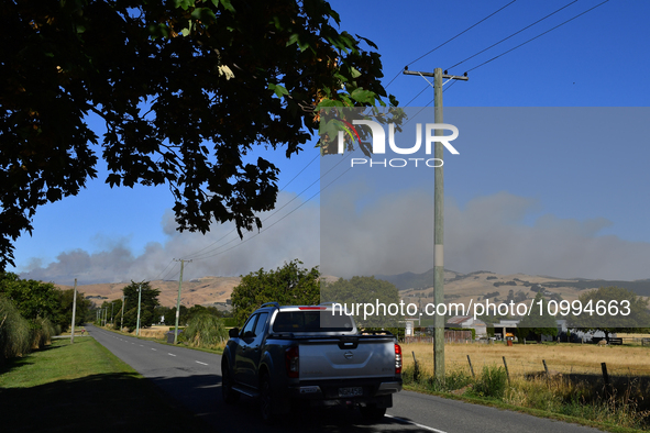 Smoke is rising thickly from a fire in Christchurch, New Zealand, on February 14, 2024. Authorities are declaring a local state of emergency...