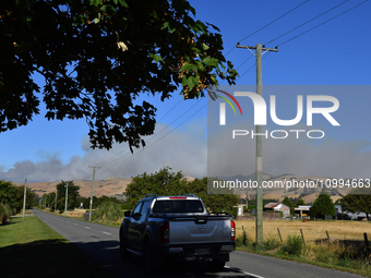 Smoke is rising thickly from a fire in Christchurch, New Zealand, on February 14, 2024. Authorities are declaring a local state of emergency...