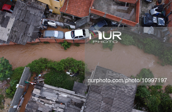 Intense rain is causing disruption in the cities of Carapicuiba and Itapevi, in Sao Paulo, Brazil, on April 13, 2023, leading to several poi...