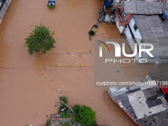 Intense rain is causing disruption in the cities of Carapicuiba and Itapevi, in Sao Paulo, Brazil, on April 13, 2023, leading to several poi...