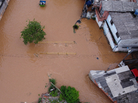 Intense rain is causing disruption in the cities of Carapicuiba and Itapevi, in Sao Paulo, Brazil, on April 13, 2023, leading to several poi...