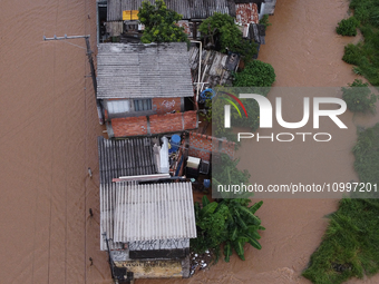 Intense rain is causing disruption in the cities of Carapicuiba and Itapevi, in Sao Paulo, Brazil, on April 13, 2023, leading to several poi...