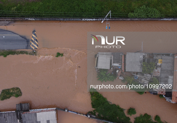 Intense rain is causing disruption in the cities of Carapicuiba and Itapevi, in Sao Paulo, Brazil, on April 13, 2023, leading to several poi...