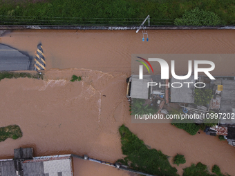 Intense rain is causing disruption in the cities of Carapicuiba and Itapevi, in Sao Paulo, Brazil, on April 13, 2023, leading to several poi...