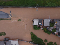 Intense rain is causing disruption in the cities of Carapicuiba and Itapevi, in Sao Paulo, Brazil, on April 13, 2023, leading to several poi...