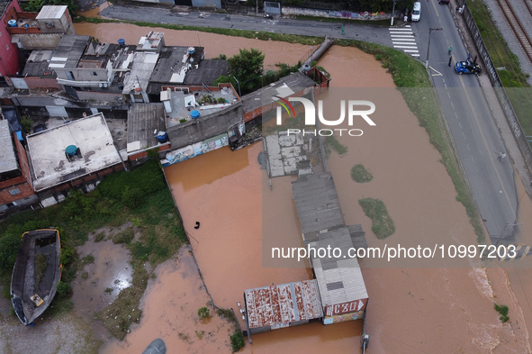 Intense rain is causing disruption in the cities of Carapicuiba and Itapevi, in Sao Paulo, Brazil, on April 13, 2023, leading to several poi...