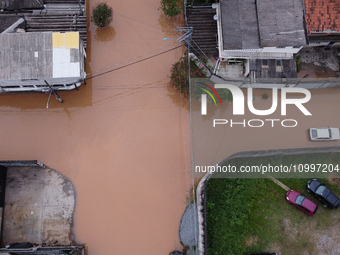 Intense rain is causing disruption in the cities of Carapicuiba and Itapevi, in Sao Paulo, Brazil, on April 13, 2023, leading to several poi...