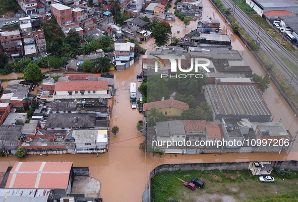 Intense rain is causing disruption in the cities of Carapicuiba and Itapevi, in Sao Paulo, Brazil, on April 13, 2023, leading to several poi...